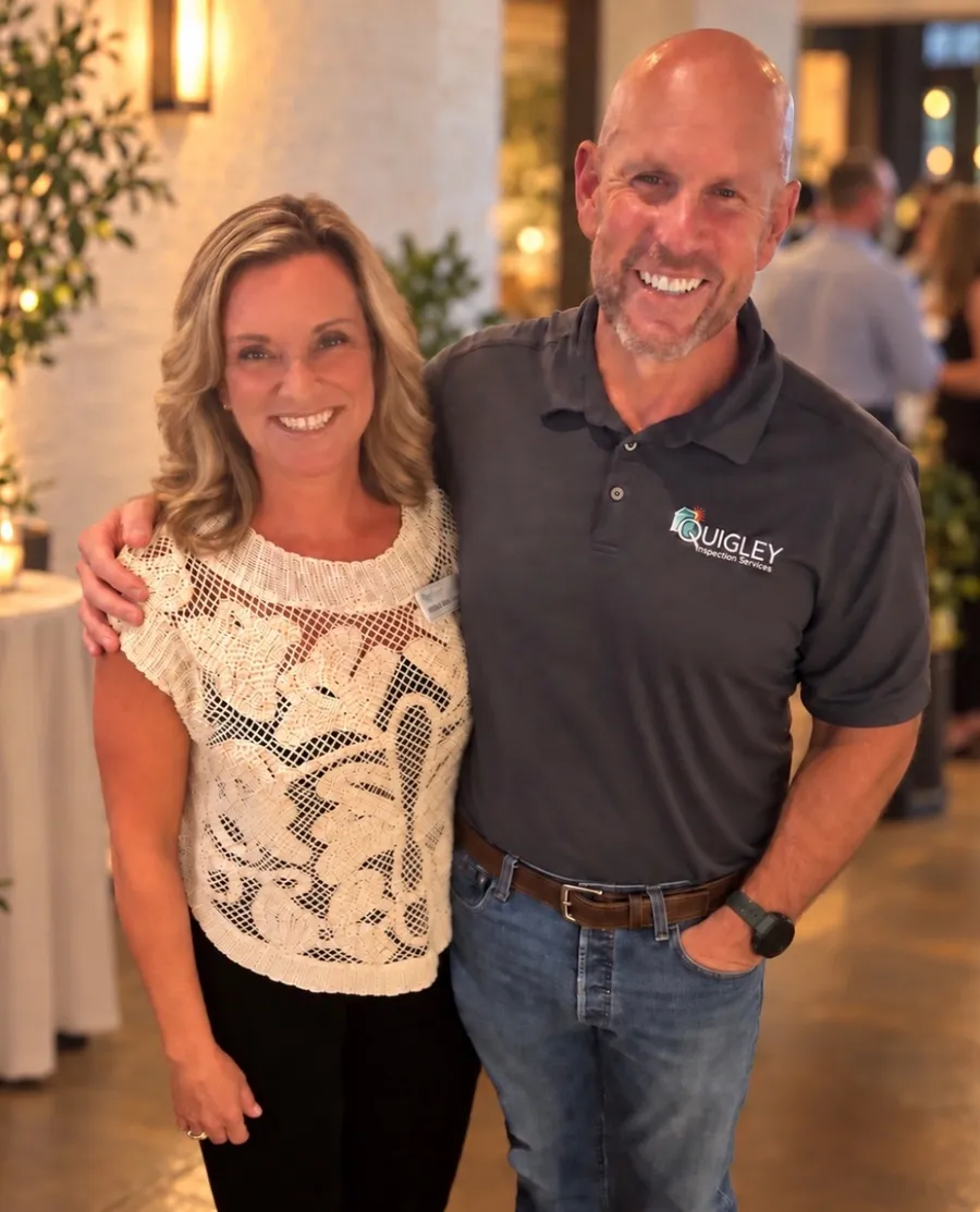 Tarin and Bobby Quigley, smiling, Bobby in a Quigley Inspection Services shirt